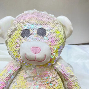 White sequence, teddy bear, backpack